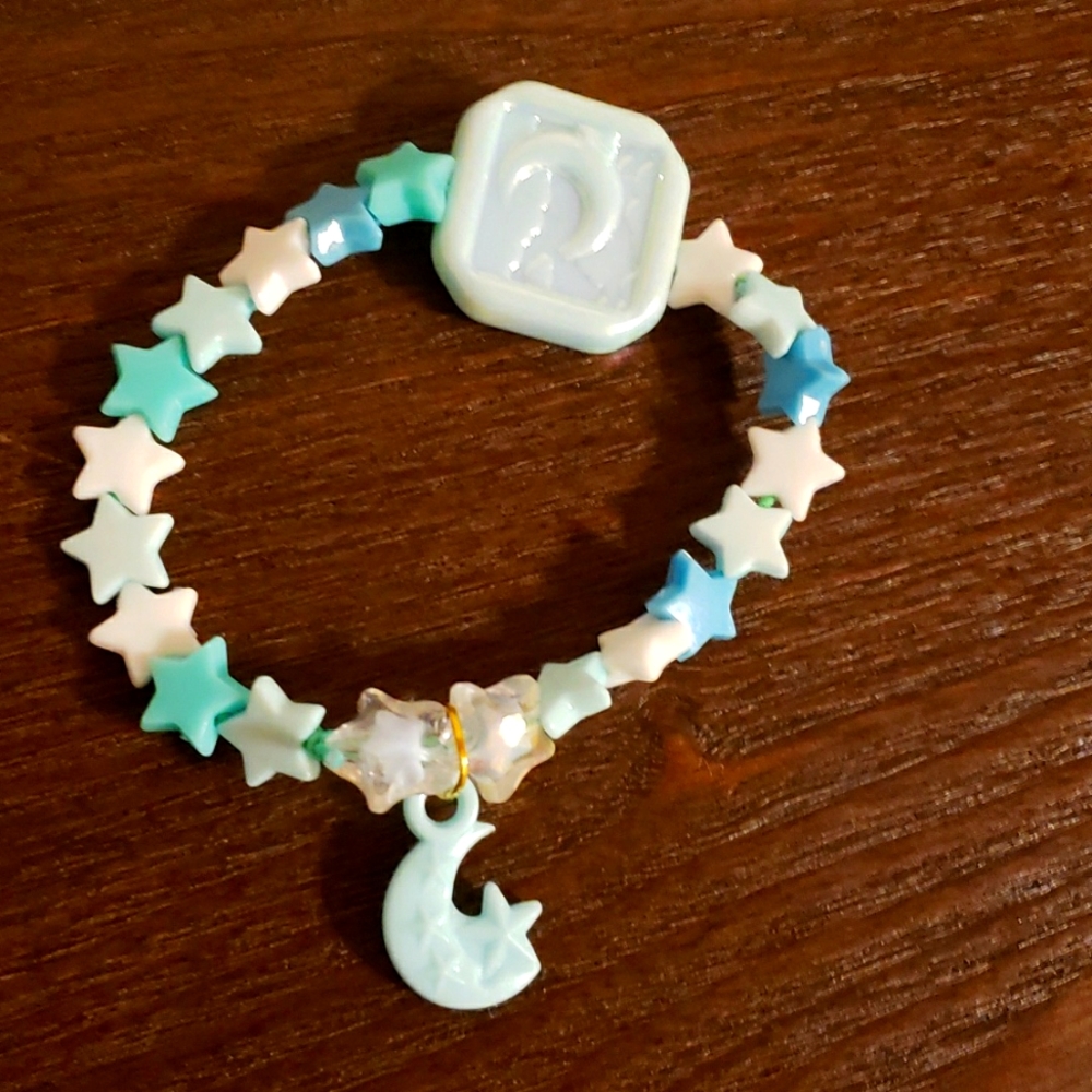 Home made bead bracelet: moon and stars
